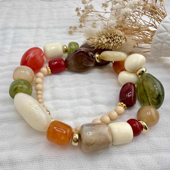 collier de créateur, grosses perles en résine multicolore et acier inox doré, atelier proche de Bordeaux