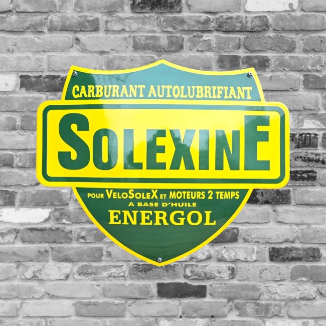 Plaque émaillée publicitaire Solexine jaune et verte carburant autolubrifiant Energol pour VéloSoleX