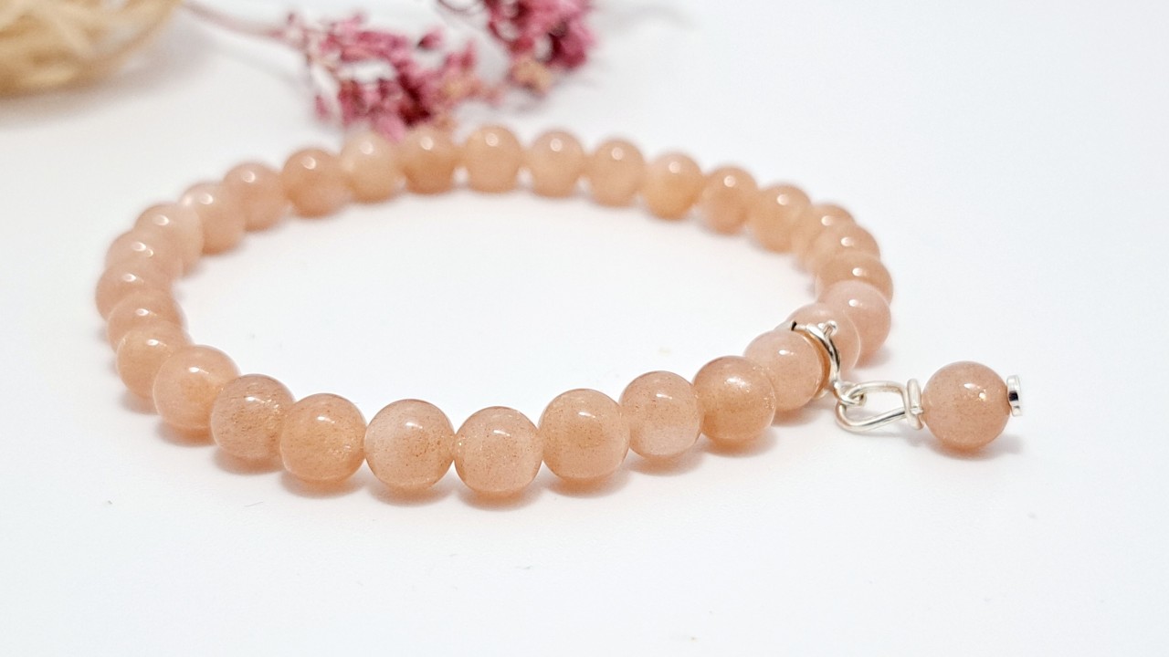 bracelet sept chakras en pierre de soleil