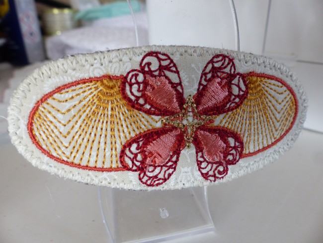 Barrette femme fleur brodée, tons jaune, rouge et orangé