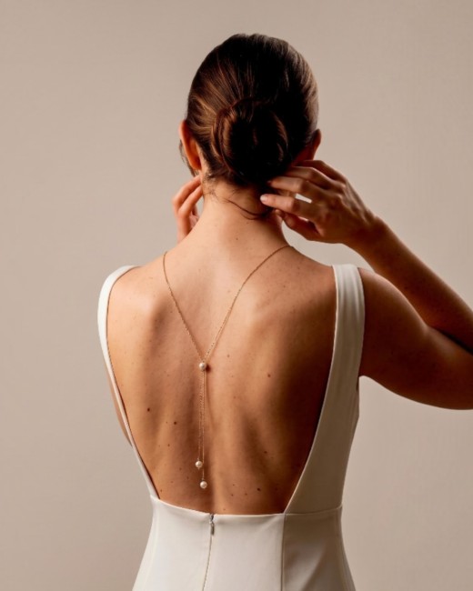Bijou de dos perles nacrées