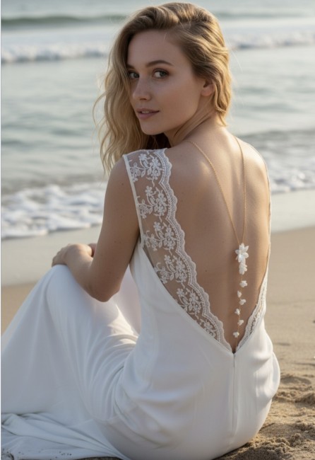 Dos nu mariée fleurs blanches