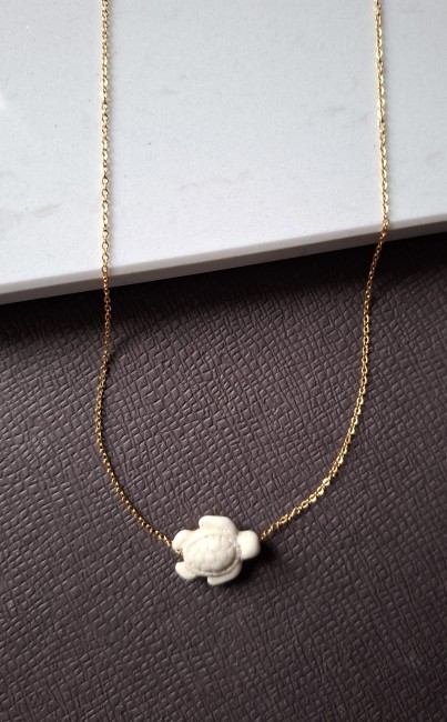 Pendentif tortue crème