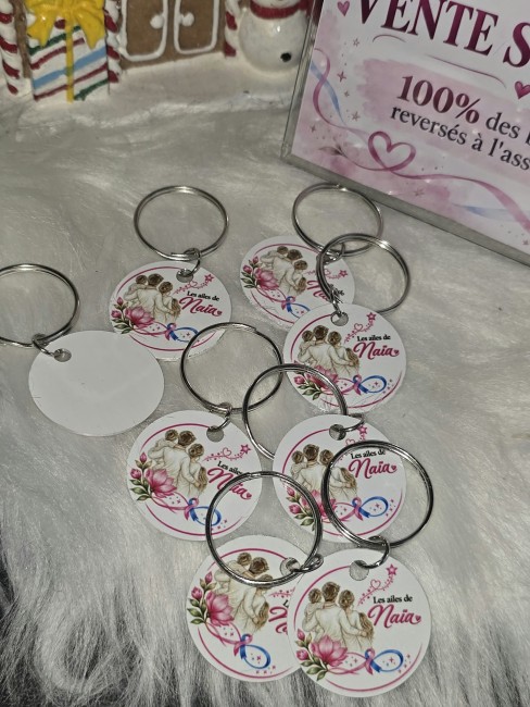 Porte-clés rond – Les Ailes de Naïa