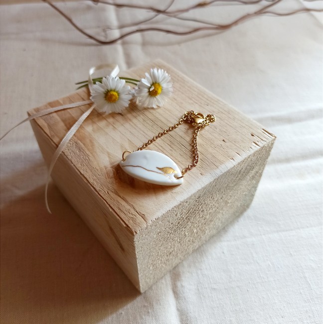 BR45 - Bracelet oiseau en céramique et or – Bijou fait main, bracelet fin et poétique 45€ (4) bracelet fait main céramique et or bijou poétique femme