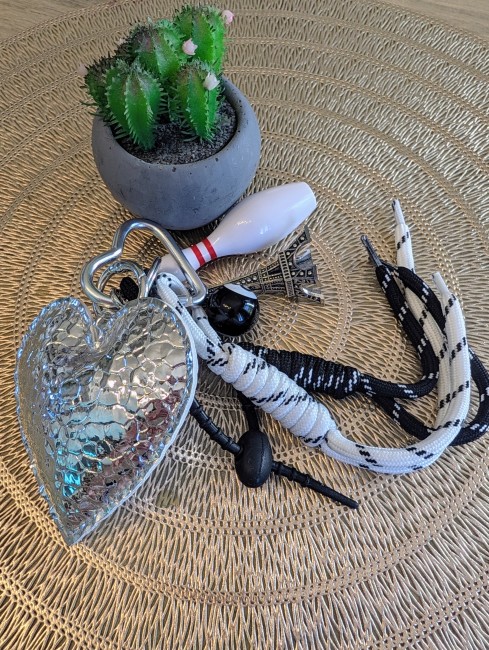 Porte clé charms pour sac argenté
