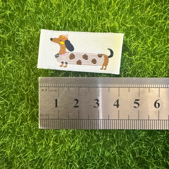 Etiquette Teckel avec règle pour échelle motif