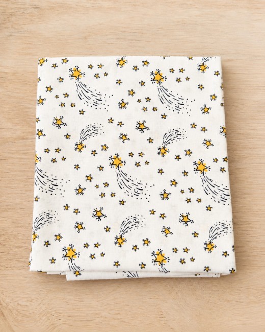 Tissu coton blanc à motifs étoiles jaunes – certifié OEKO-TEX®