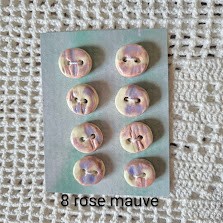 8 boutons rose mauves nom