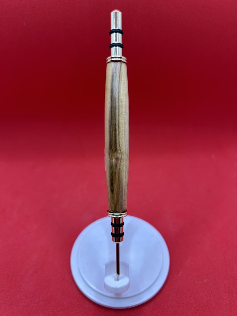 Découd-vite en bois de mirabellier avec finition métallique dorée