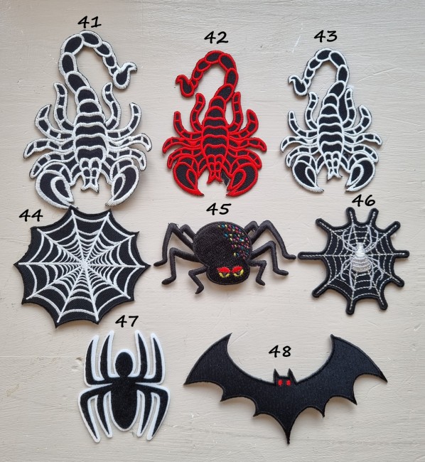 écusson scorpion araignée chauve souris