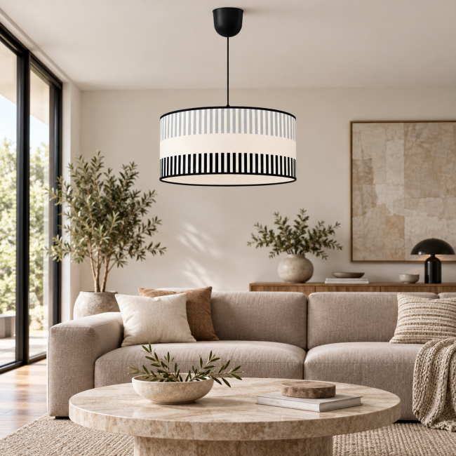 Suspension RIVAGE gris en situation dans un intérieur, motifs graphiques et finitions noires