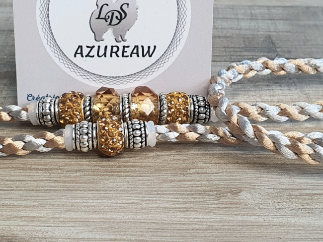 Laisse d’exposition CHAMPAGNE ARGENTÉE – tressage champagne et argent, perles champagne et finition argentée.