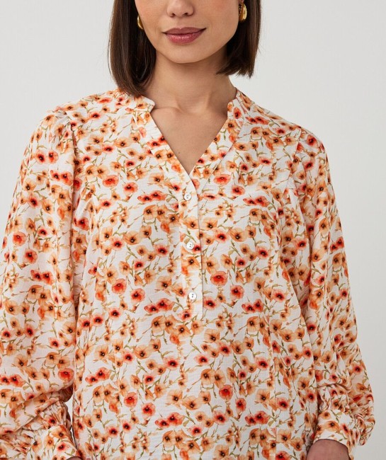 Blouse Esqualo à imprimé floral écru et orange, manches longues bouffantes, col V boutonné et coupe fluide