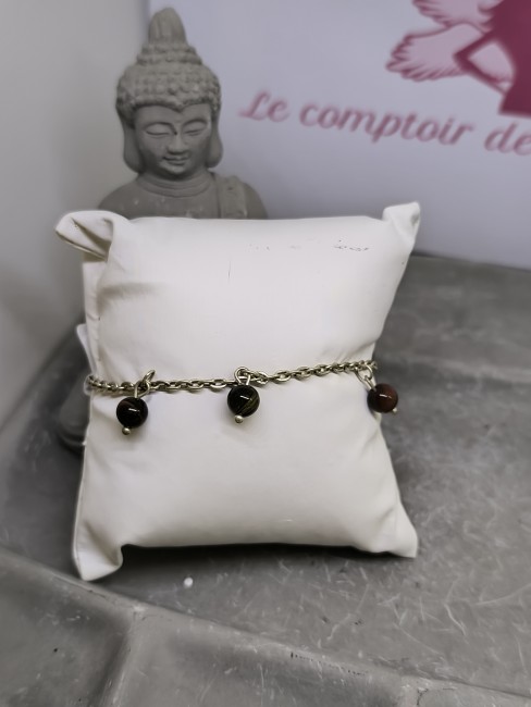 Accessoire élégant en argent et pierres symboliques. Bracelet œil de fer ancrage