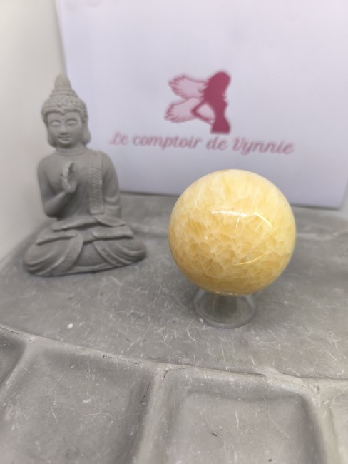 Calcite Orange – Énergie et créativité Sphère en calcite orange aux motifs cristallins