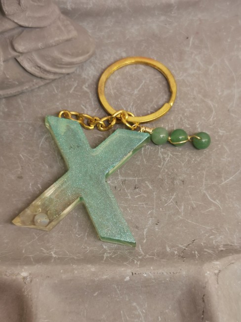 porte clé X amethyste doré