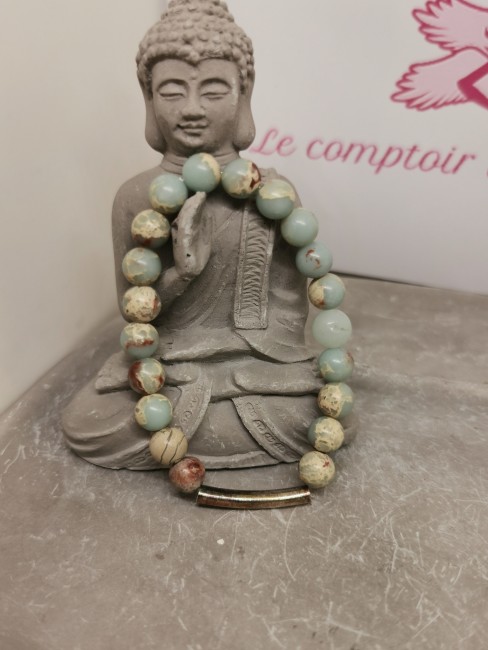 bracelet serpentine bleue avec tube doré