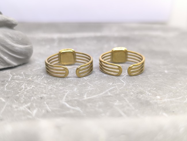 bijou acier doré pierre verte imitation naturelle