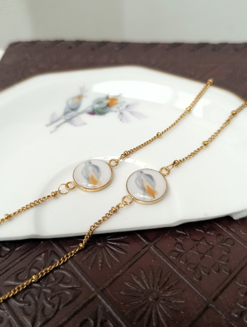 Bracelt acier inoxydable doré et porcelaine