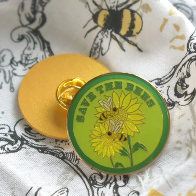 Broche Save the Bees avec effet pailleté