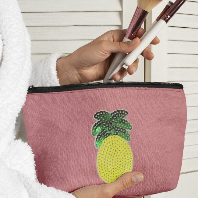 Fuit ananas thermocollant sur une pochette rose foncé
