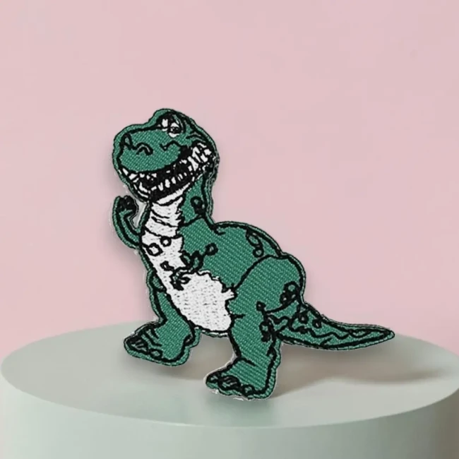 Écusson thermocollant dinosaure vert Patch brodé dinosaure vert au sourire malicieux