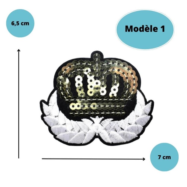 Détail du patch couronne et feuilles brodées blanches Zoom sur la broderie à sequins dorés du patch : 7 x 6,5 cm