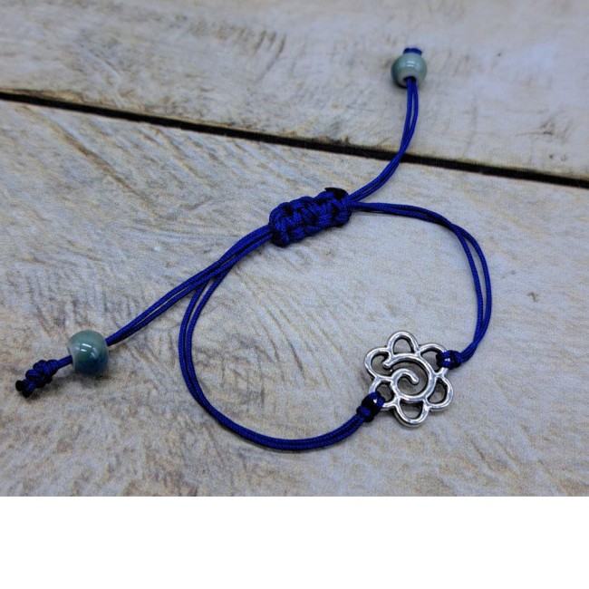Bracelet ajustable en nylon avec connecteur fleur en métal argenté et perle en céramique Bracelet ajustable en nylon avec connecteur fleur en métal argenté et perle en céramique