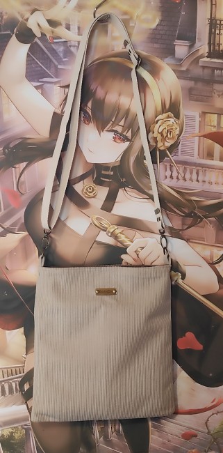 pochette avec bandoulière réglable