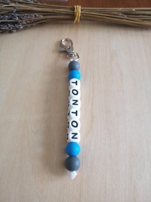 porte clé perle ronde gris bleu