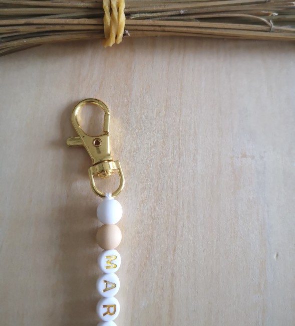 porte clé blanc beige haut